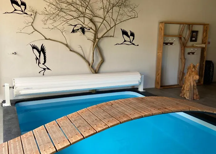 GITE de L'ATELIER LOFT INDUSTRIEL CLIMATISE PISCINE INTERIEURE PRIVEE TERRASSE Сasa de vacaciones